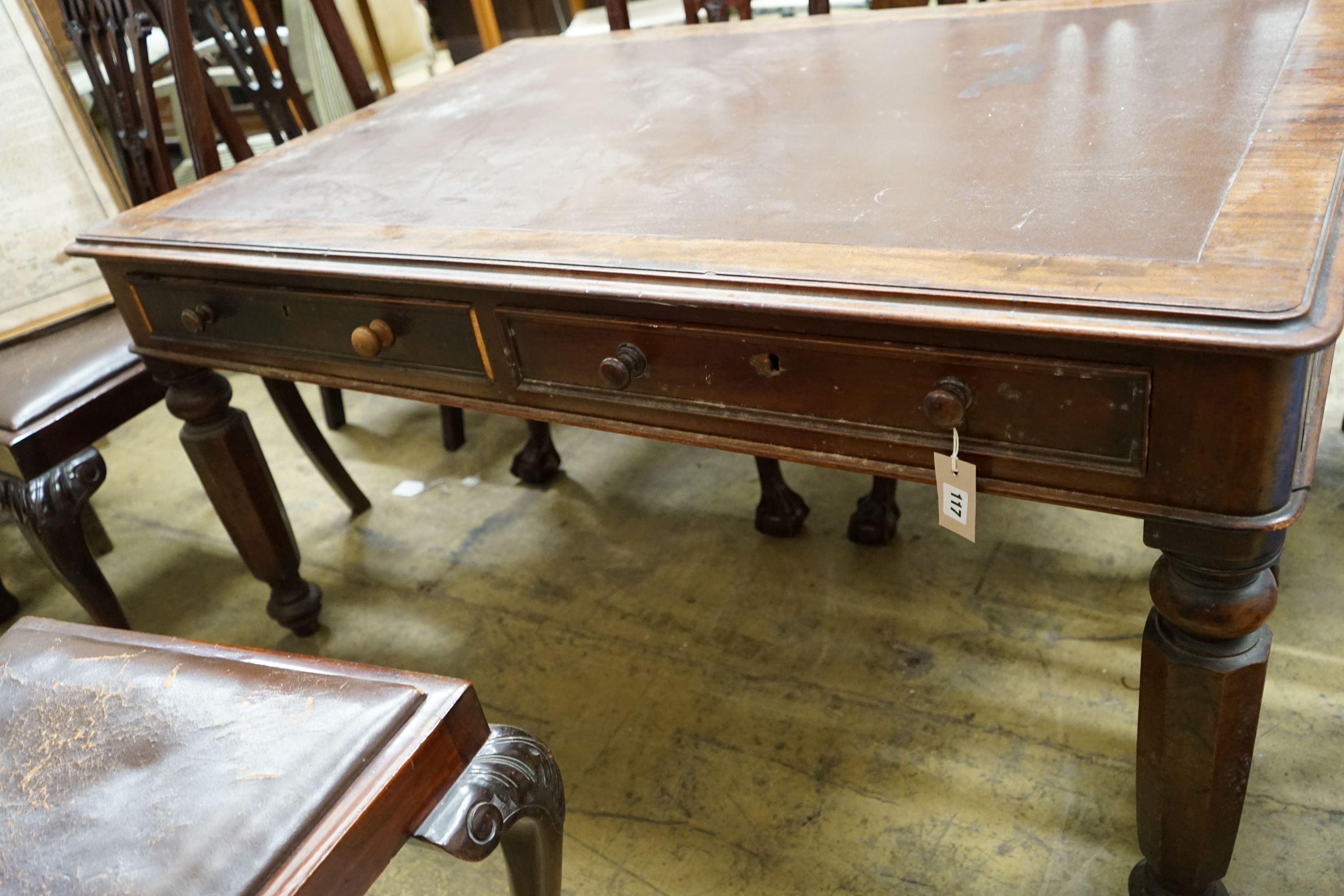 An early 19th century mahogany partner's writing table, cut down, length 136cm, width 92cm, height 66cm